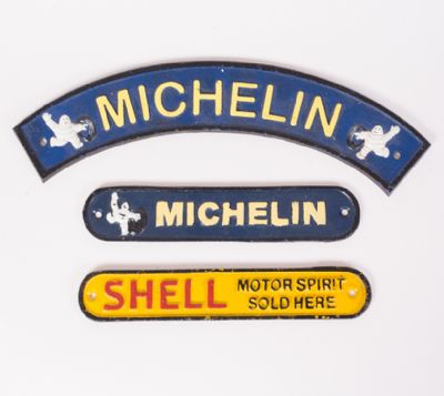 Cast Iron Shell & Michelin Signs at Dolan's Art Auction House