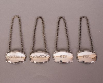 Set of Silver Plated Decanter Labels at Dolan's Art Auction House