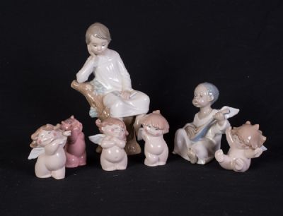 Lladro & Nao Figurines at Dolan's Art Auction House