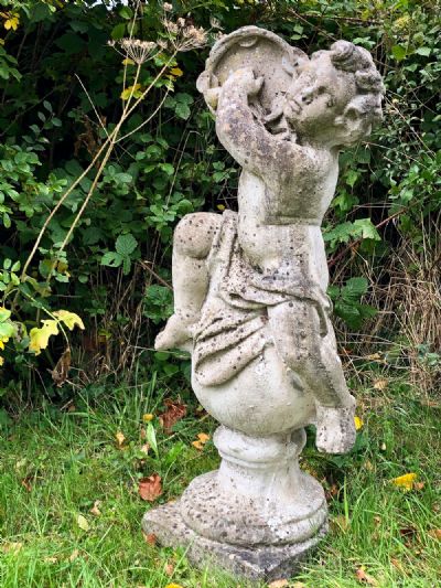 Garden Figure of a Cherub at Dolan's Art Auction House